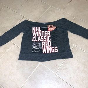 a NHL red wings crop top color is grey, red and white and size medium